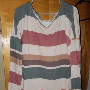 Women's striped long sleeved shirt off the shoulder.